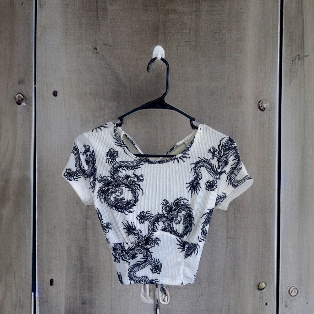 Crop top t-short with cut out back and criss cross straps.